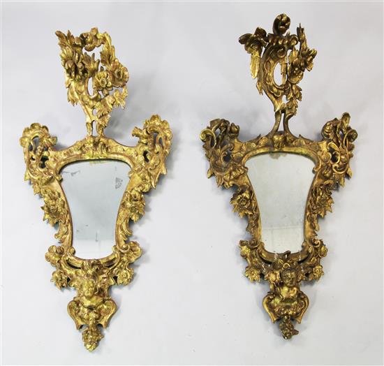 A 19th century Italian carved giltwood cartouche framed wall mirror,